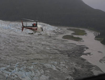 helicopter over glacier