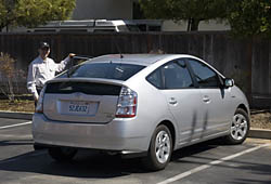 Tom with Prius rental car